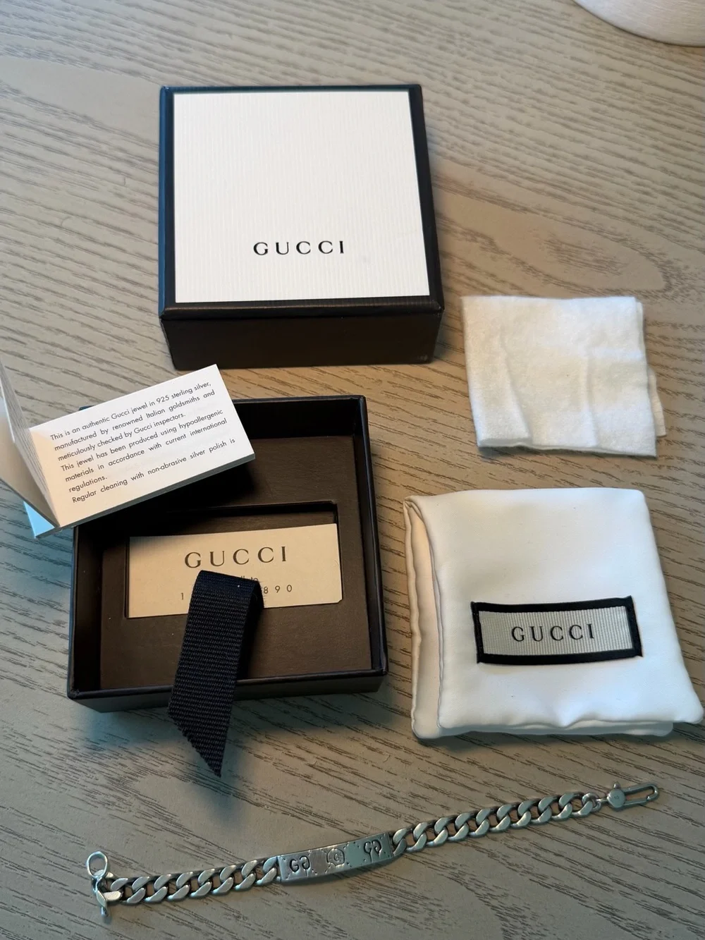 Gucci Silver Curb ID Bracelet with Branded Plate